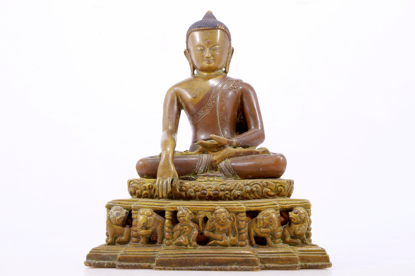 A solemn alloy copper statue of Gautama Buddha