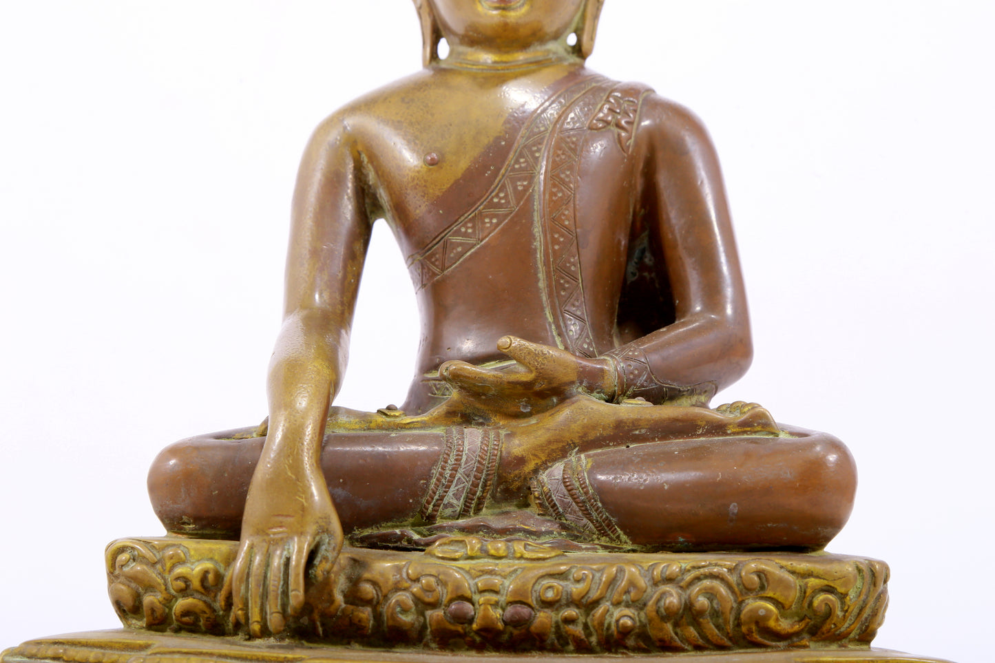 A solemn alloy copper statue of Gautama Buddha