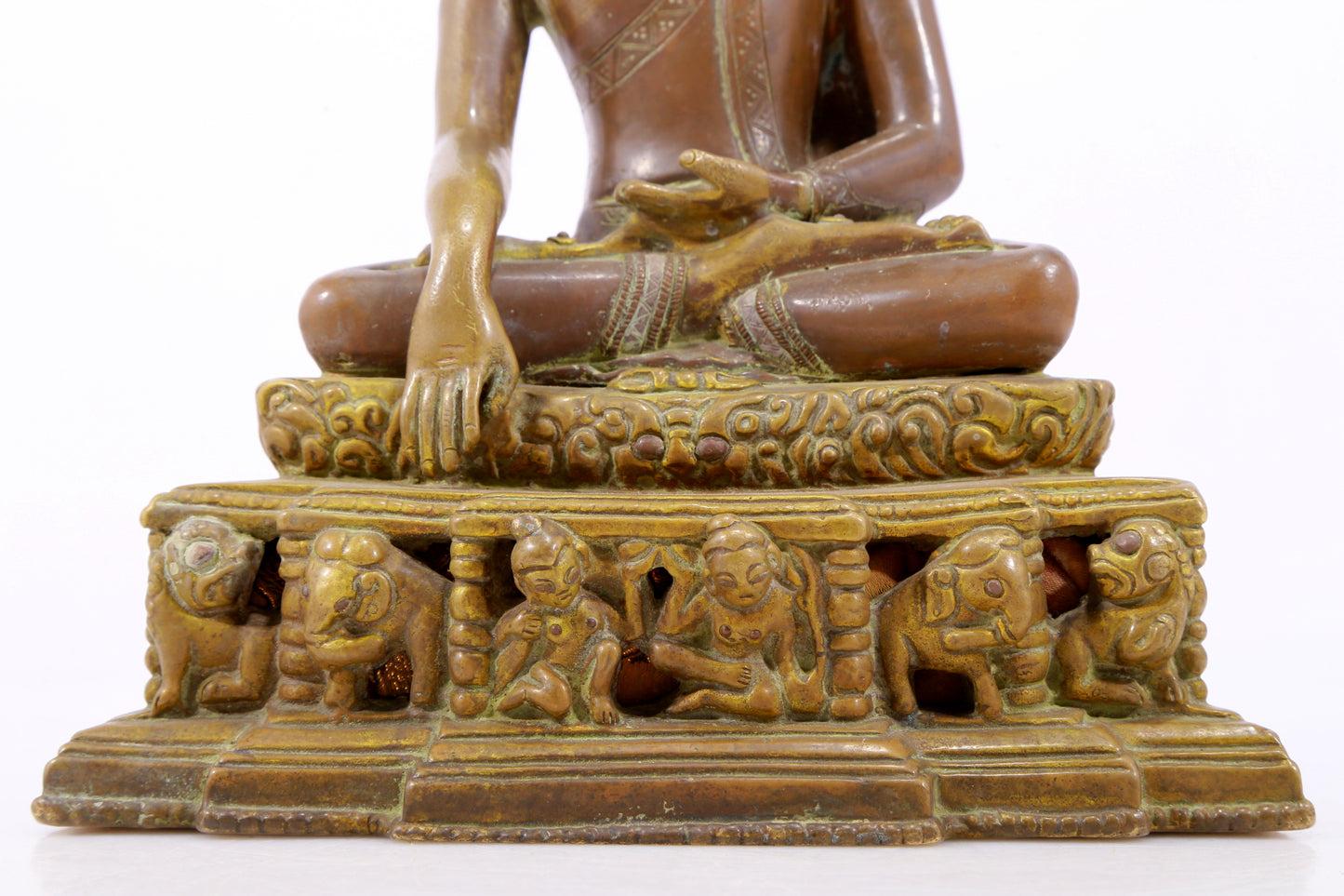 A solemn alloy copper statue of Gautama Buddha