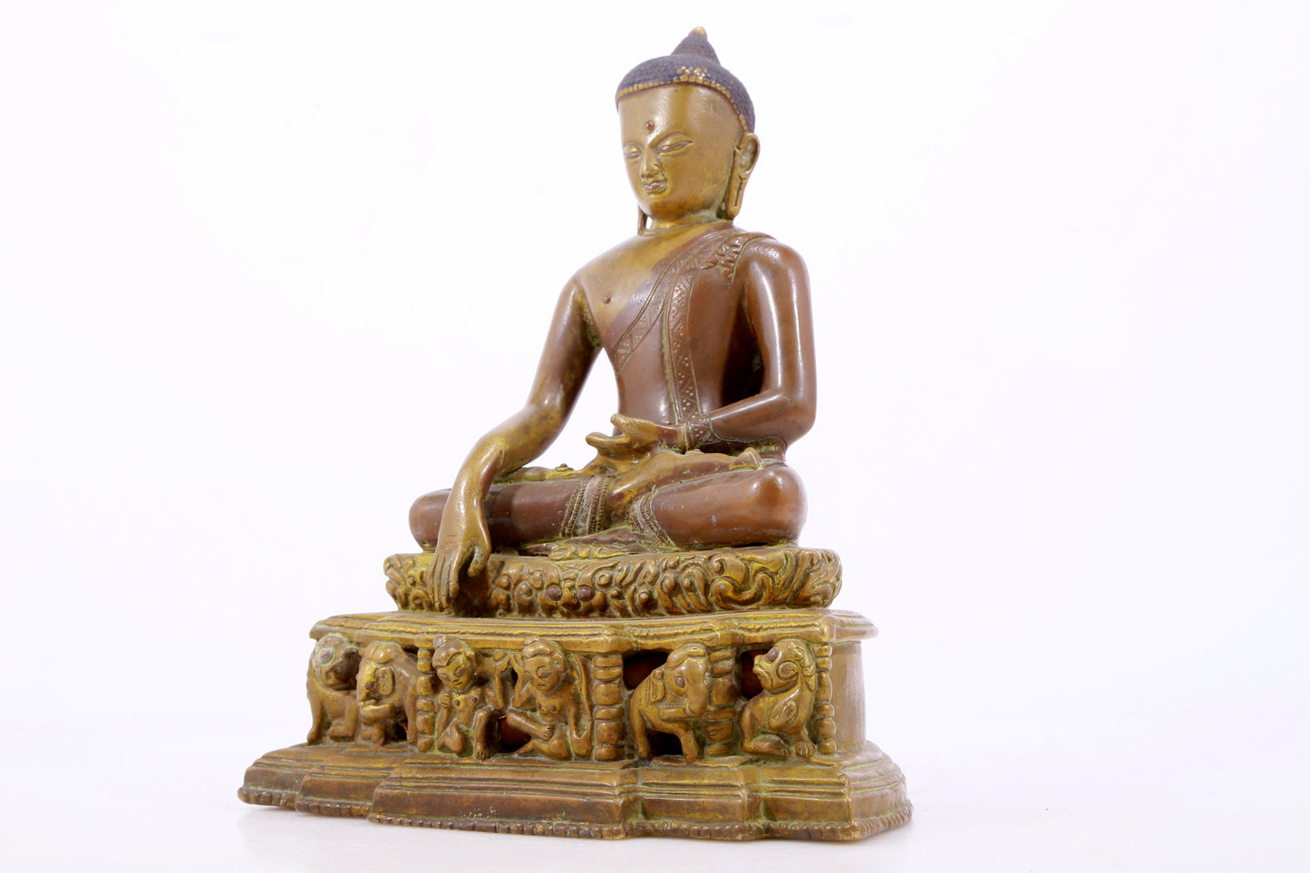 A solemn alloy copper statue of Gautama Buddha