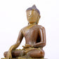 A solemn alloy copper statue of Gautama Buddha