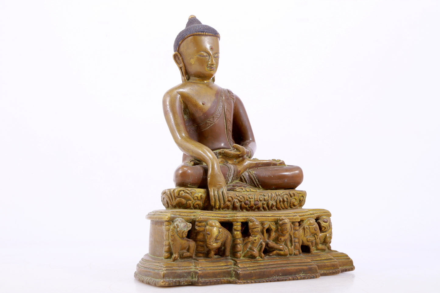 A solemn alloy copper statue of Gautama Buddha