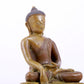 A solemn alloy copper statue of Gautama Buddha