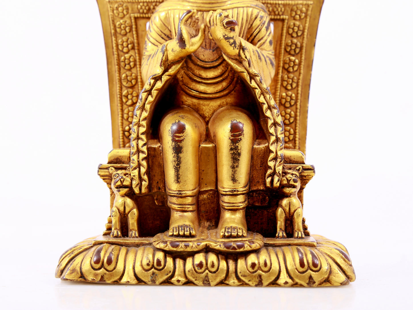 A majestic gilt bronze statue of Sakyamuni