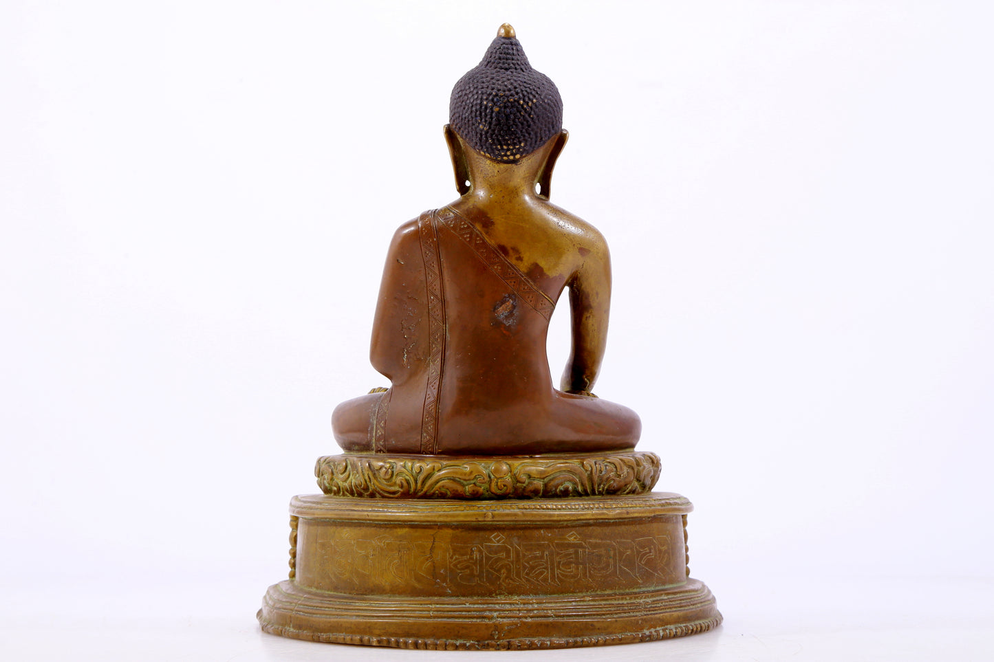 A solemn alloy copper statue of Gautama Buddha