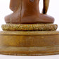 A solemn alloy copper statue of Gautama Buddha