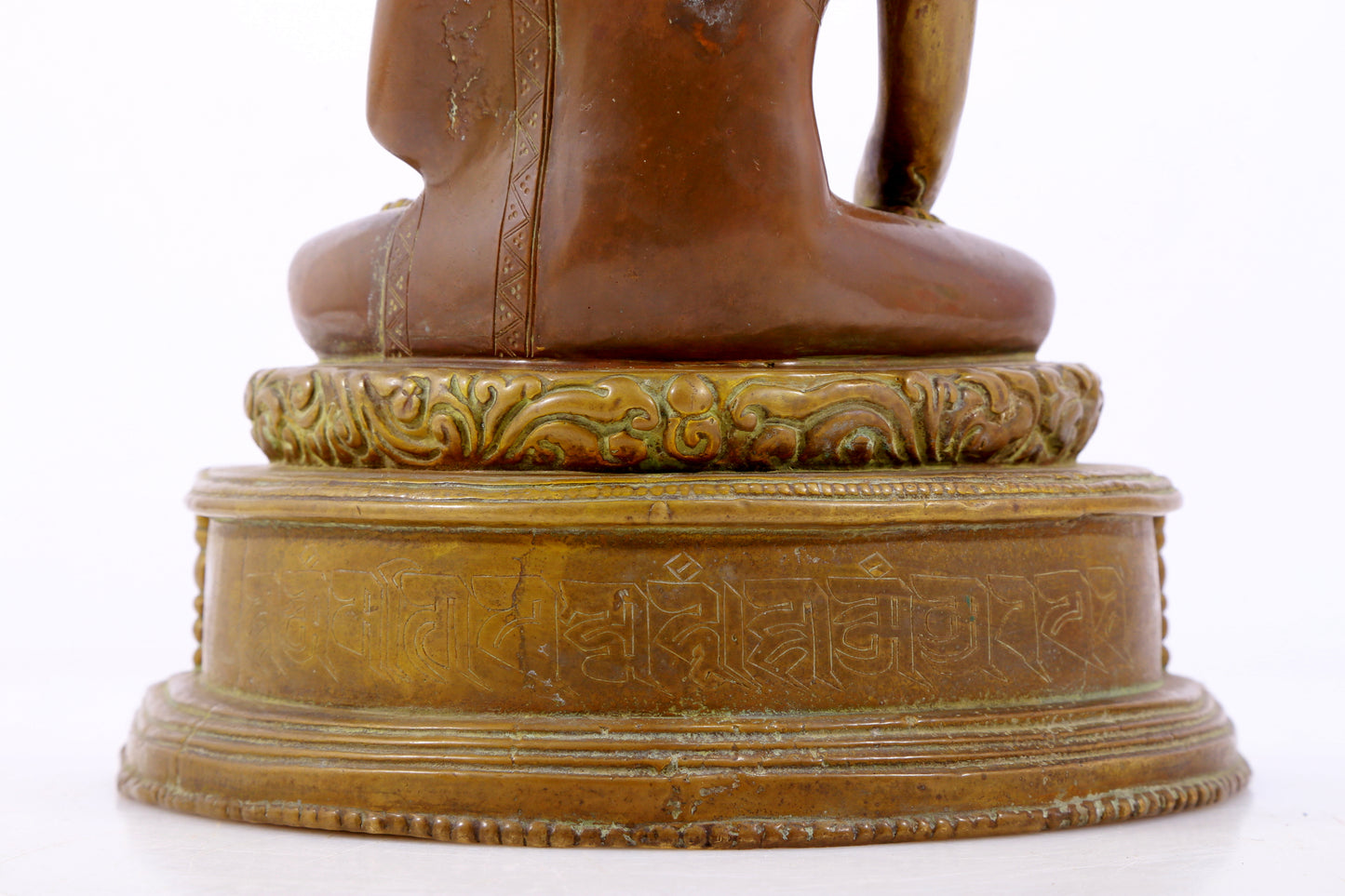 A solemn alloy copper statue of Gautama Buddha