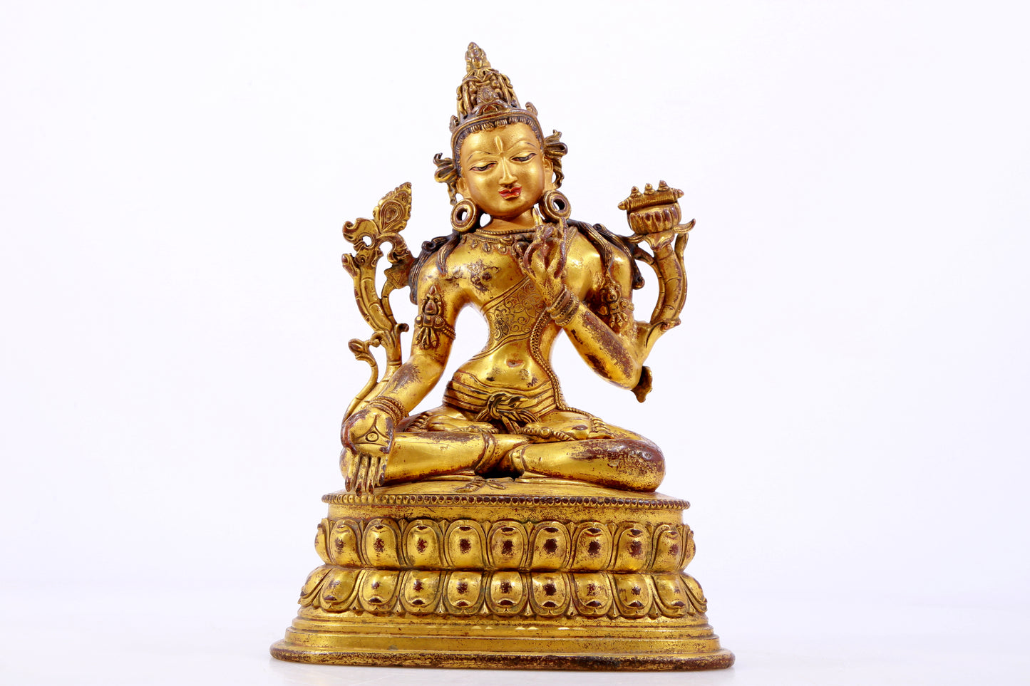 A majestic gilt bronze statue of Tara