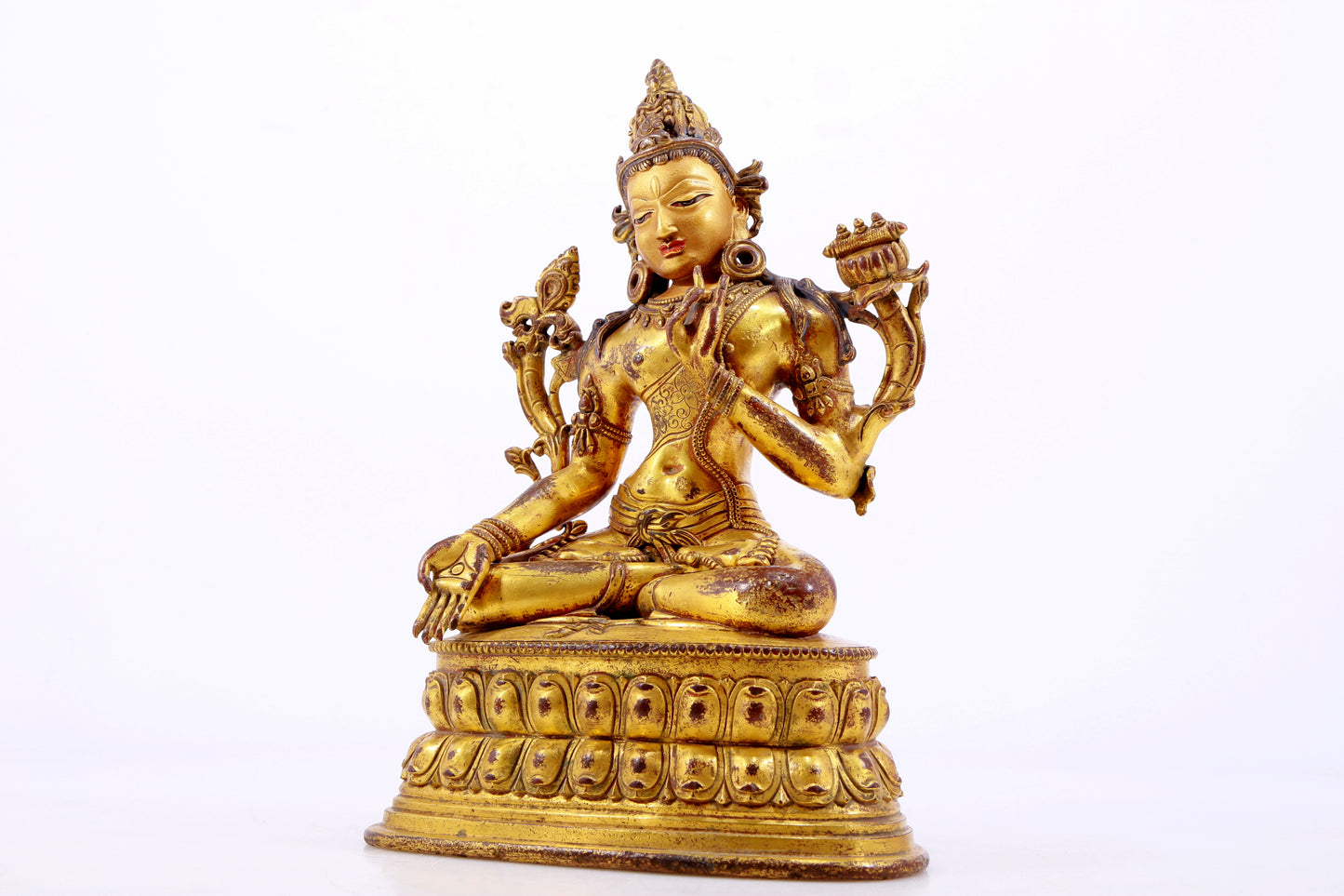 A majestic gilt bronze statue of Tara