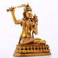 A majestic gilt bronze statue of Manjusri Bodhisattva