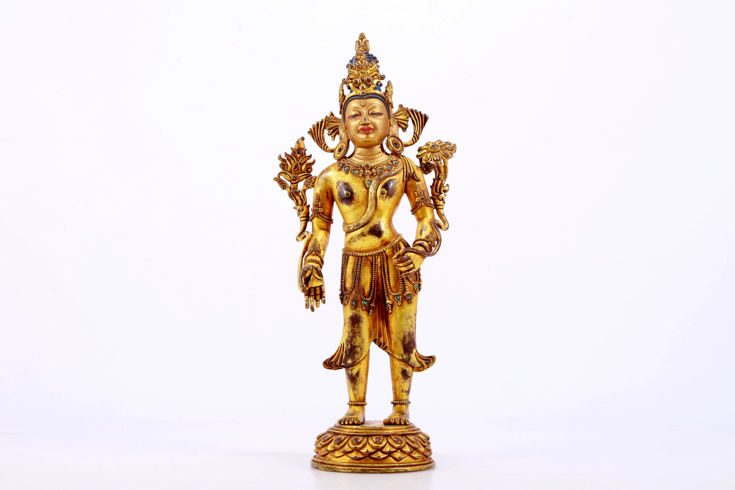 majestic gilt bronze statue of Tara inlaid with turquoise