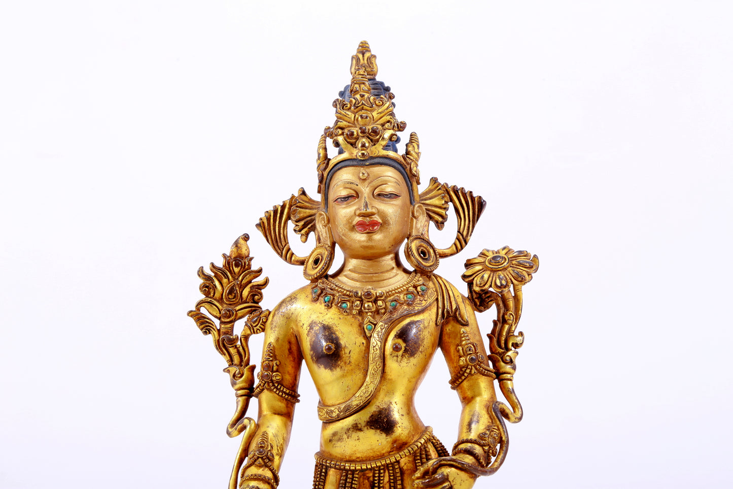 majestic gilt bronze statue of Tara inlaid with turquoise