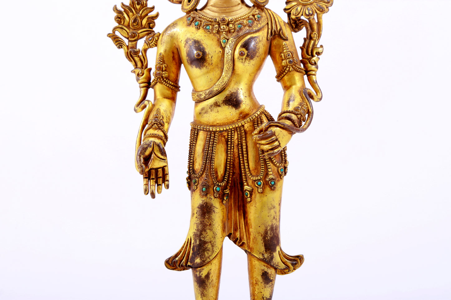 majestic gilt bronze statue of Tara inlaid with turquoise