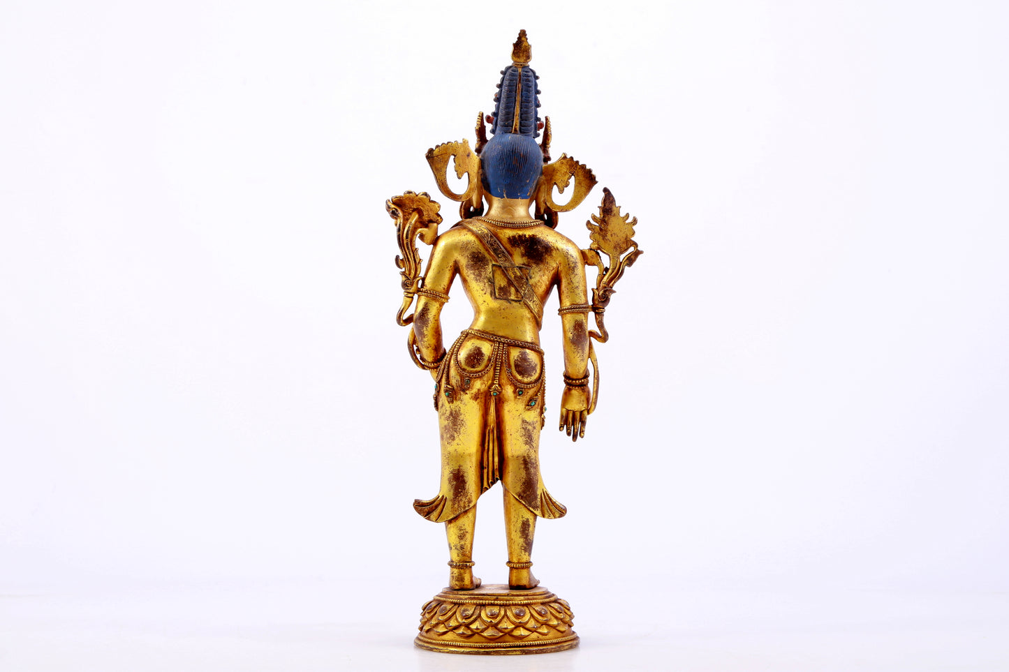 majestic gilt bronze statue of Tara inlaid with turquoise