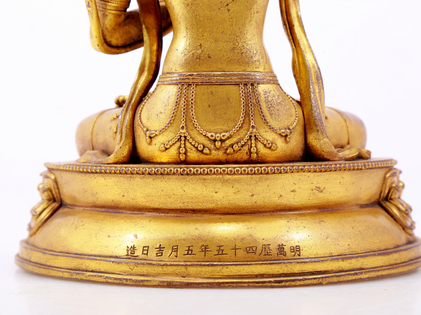 A majestic gilt bronze statue of Manjusri Bodhisattva