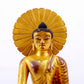 A majestic gilt bronze statue of Sakyamuni