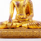 A majestic gilt bronze statue of Sakyamuni