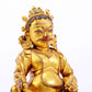 A stately gilt bronze statue of the God of Wealth with inscription