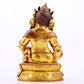 A stately gilt bronze statue of the God of Wealth with inscription