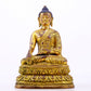 A majestic gilt bronze statue of Sakyamuni