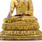 A majestic gilt bronze statue of Sakyamuni