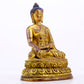 A majestic gilt bronze statue of Sakyamuni