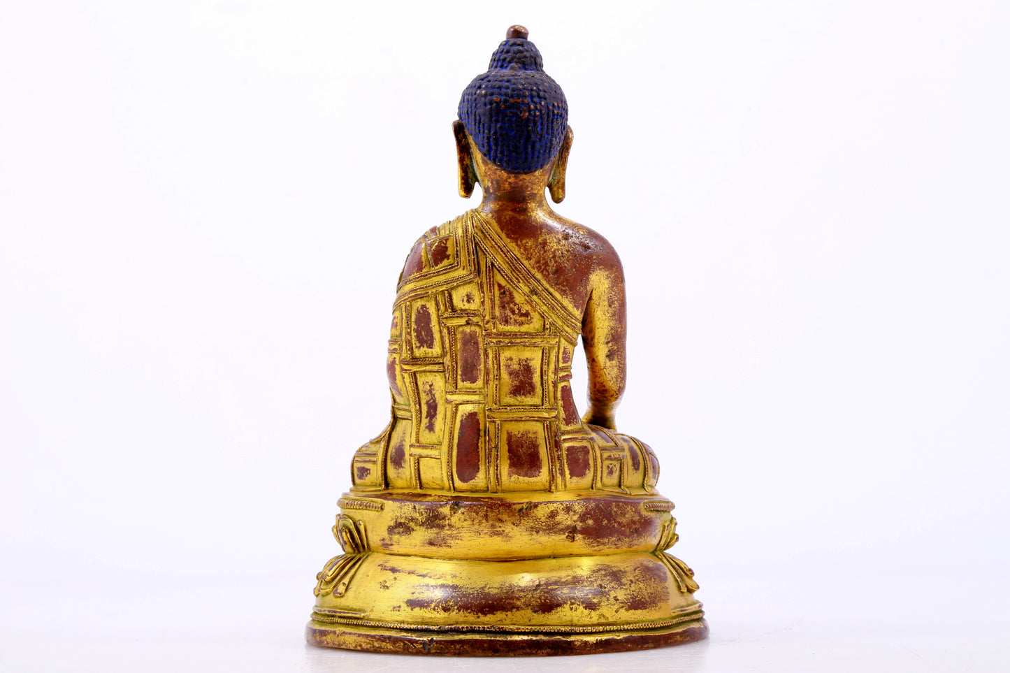 A majestic gilt bronze statue of Sakyamuni