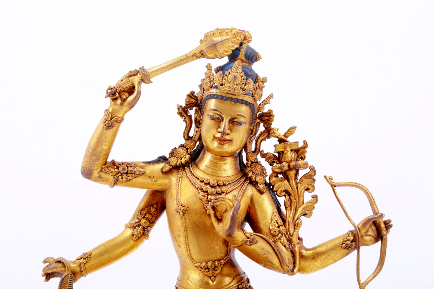 A majestic gilt bronze statue of Manjusri Bodhisattva