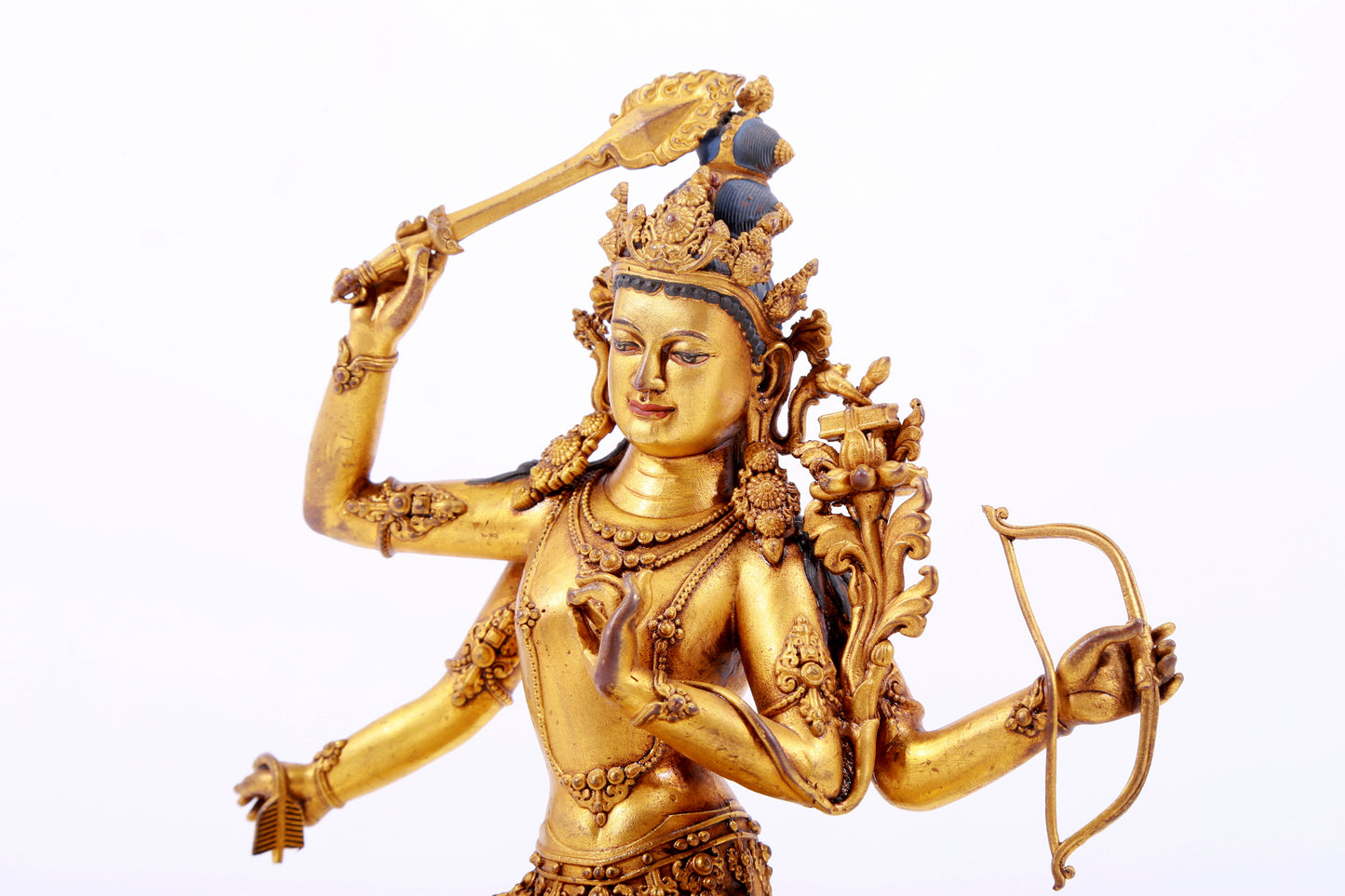 A majestic gilt bronze statue of Manjusri Bodhisattva