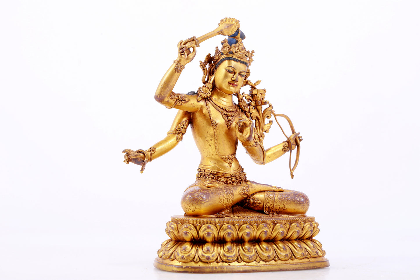 A majestic gilt bronze statue of Manjusri Bodhisattva