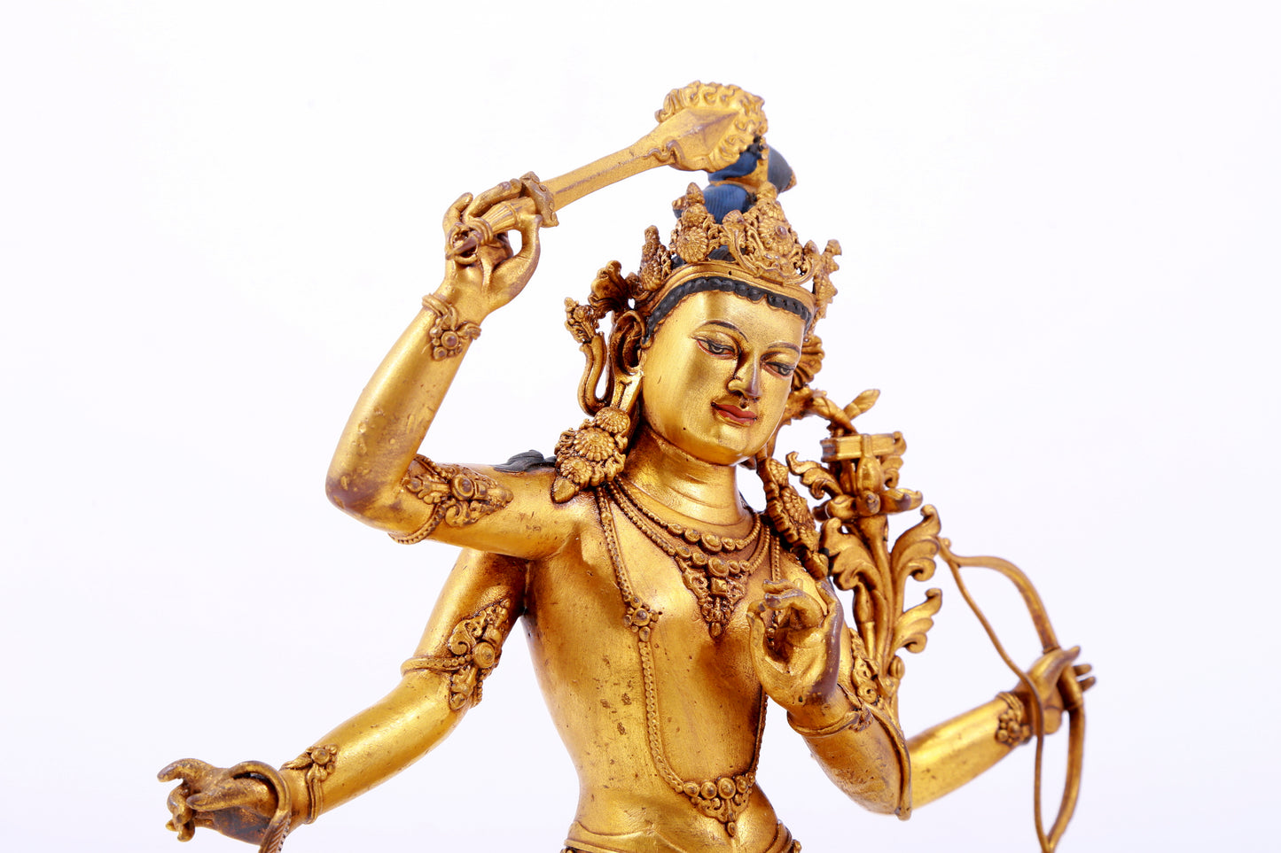 A majestic gilt bronze statue of Manjusri Bodhisattva