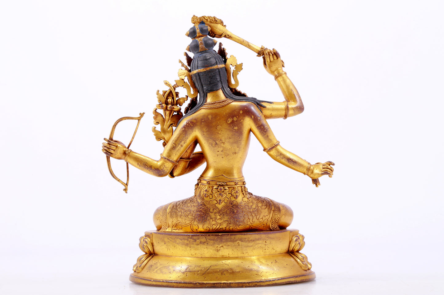 A majestic gilt bronze statue of Manjusri Bodhisattva