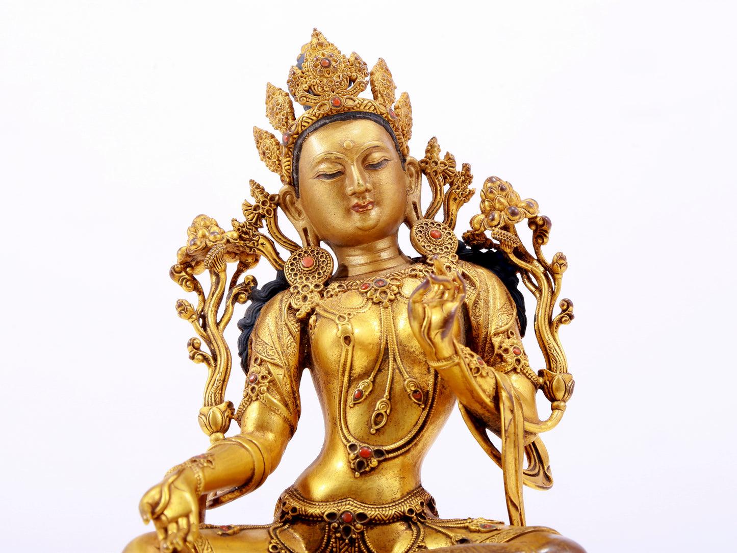 A majestic gilt bronze statue of green Tara