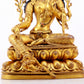 A majestic gilt bronze statue of green Tara