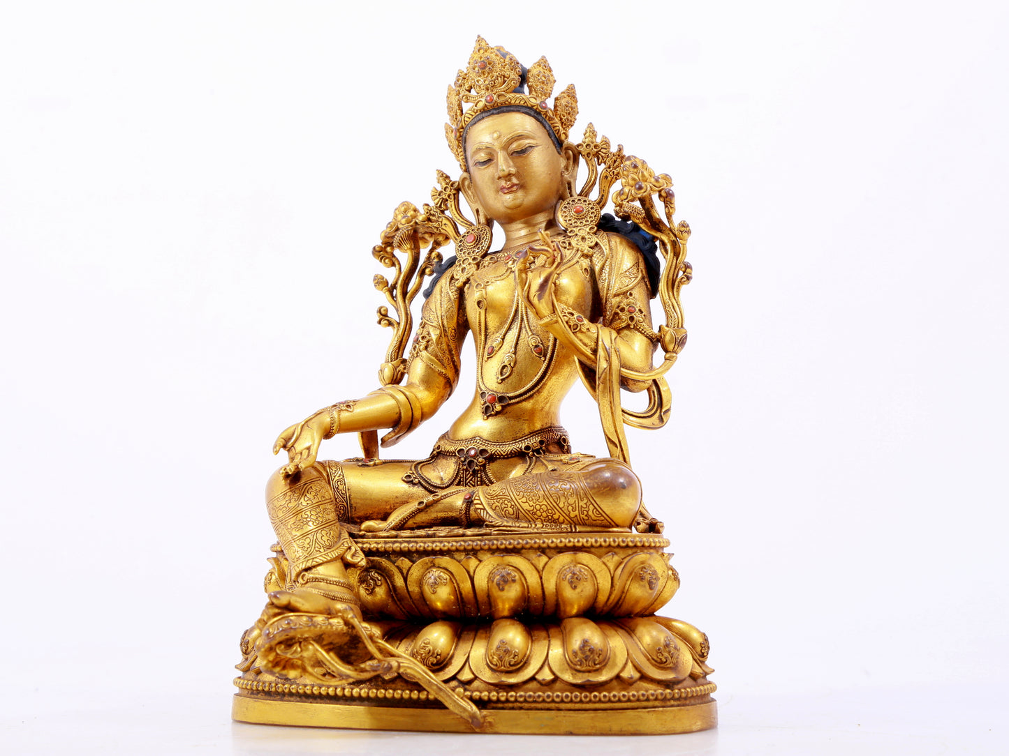 A majestic gilt bronze statue of green Tara