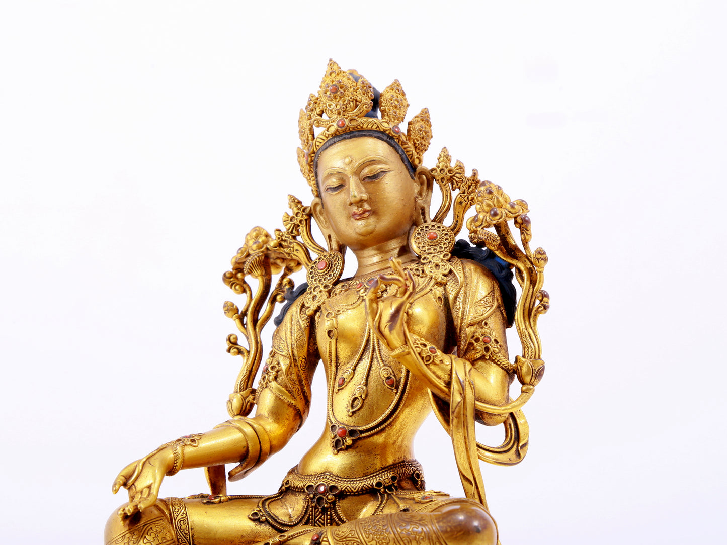 A majestic gilt bronze statue of green Tara