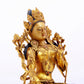 A majestic gilt bronze statue of green Tara