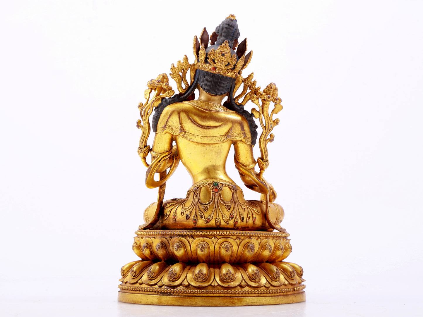 A majestic gilt bronze statue of green Tara