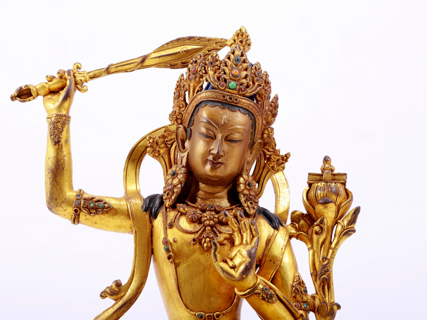 A solemn gilt bronze statue of Manjushri Bodhisattva inlaid with hundreds of treasures