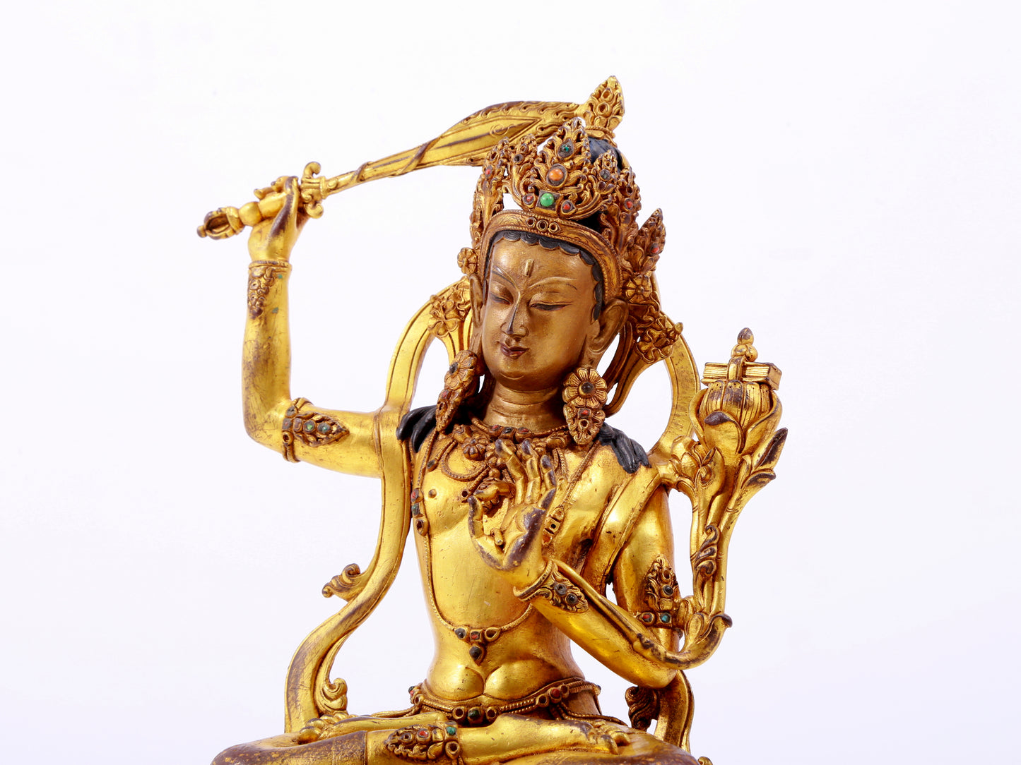 A solemn gilt bronze statue of Manjushri Bodhisattva inlaid with hundreds of treasures