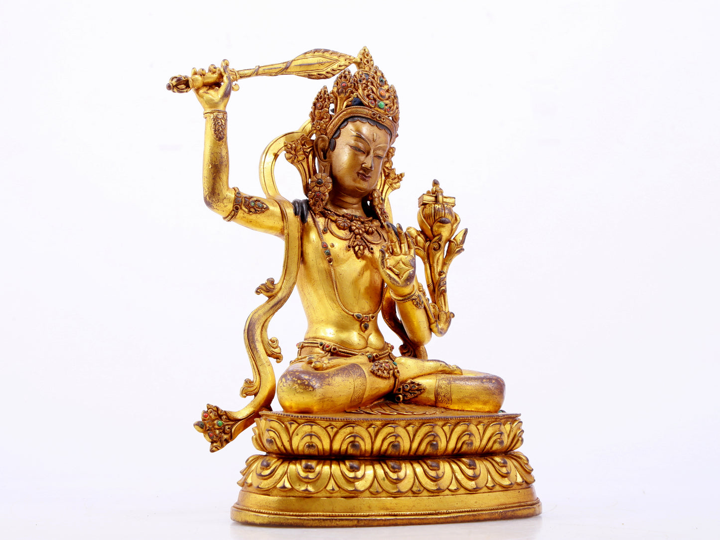 A solemn gilt bronze statue of Manjushri Bodhisattva inlaid with hundreds of treasures