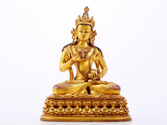 A solemn gilt bronze statue of Vajrasattva