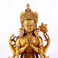 A majestic gilt bronze four-armed Guanyin statue