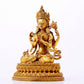 A majestic gilt bronze four-armed Guanyin statue