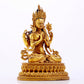 A majestic gilt bronze four-armed Guanyin statue