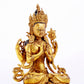 A majestic gilt bronze four-armed Guanyin statue