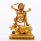 A solemn gilt bronze Vajra statue