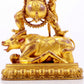 A solemn gilt bronze Vajra statue