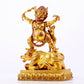 A solemn gilt bronze Vajra statue