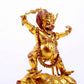 A solemn gilt bronze Vajra statue